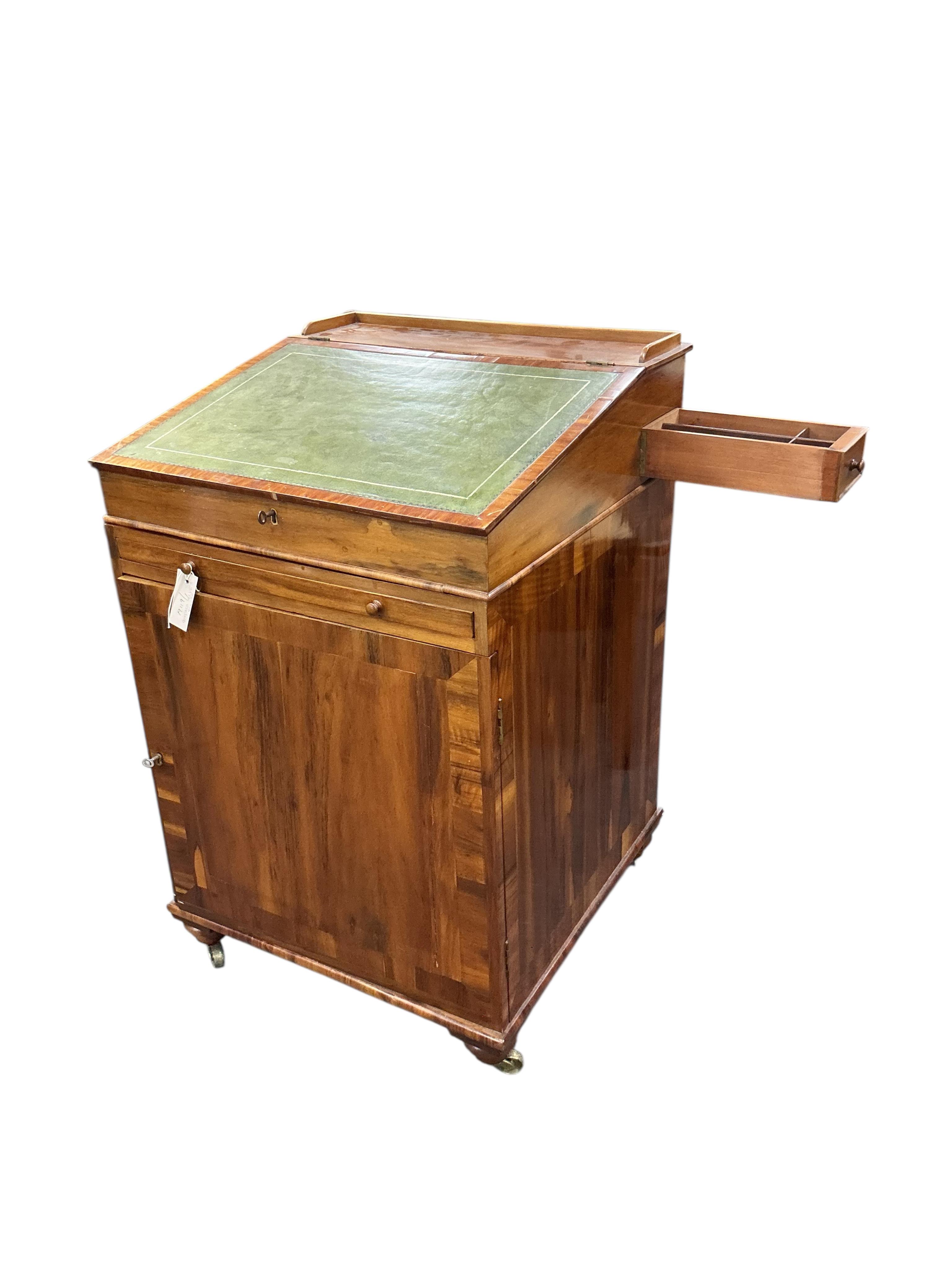 A 19th century Gonzalo Alves Davenport, width 57cm, depth 57cm, height 89cm